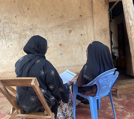 A GJK team member conducting a confidential documentation interview in Kwale County